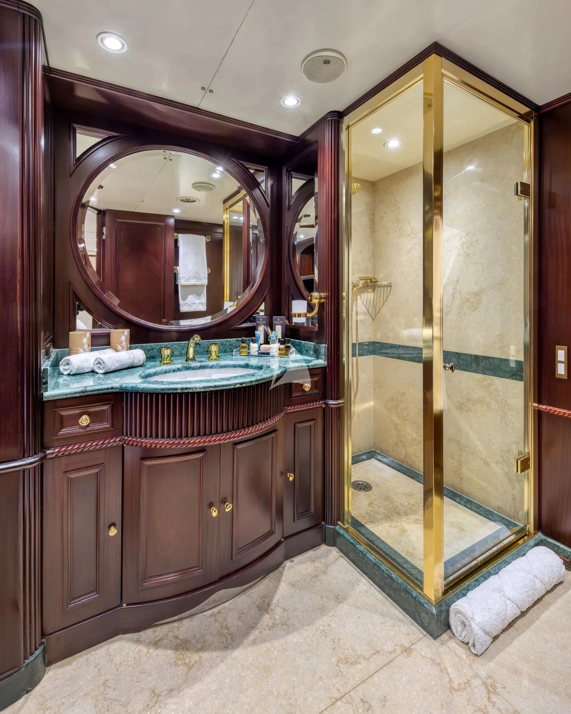 a bathroom with a large mirror aboard AKIRA ONE Yacht for Charter