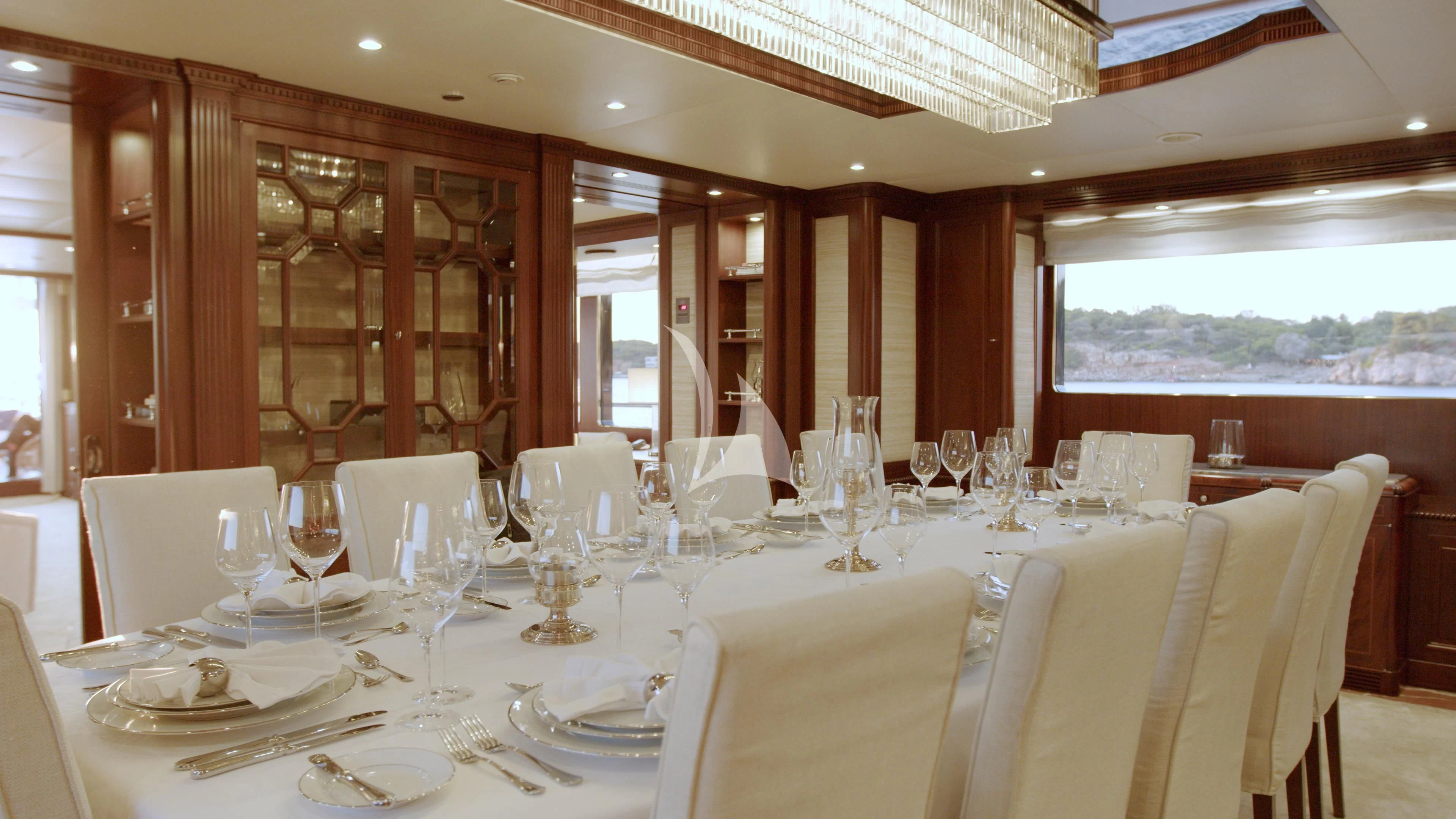 a table set for a dinner aboard AKIRA ONE Yacht for Charter