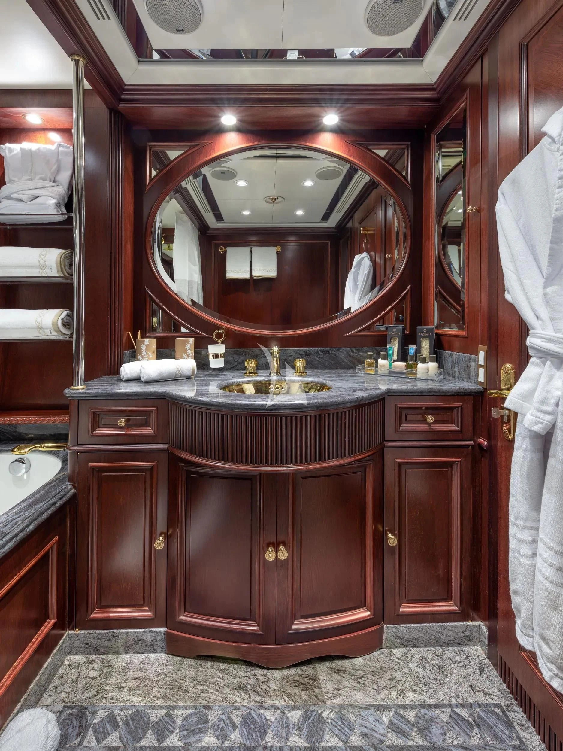 a bathroom with a large mirror aboard AKIRA ONE Yacht for Charter