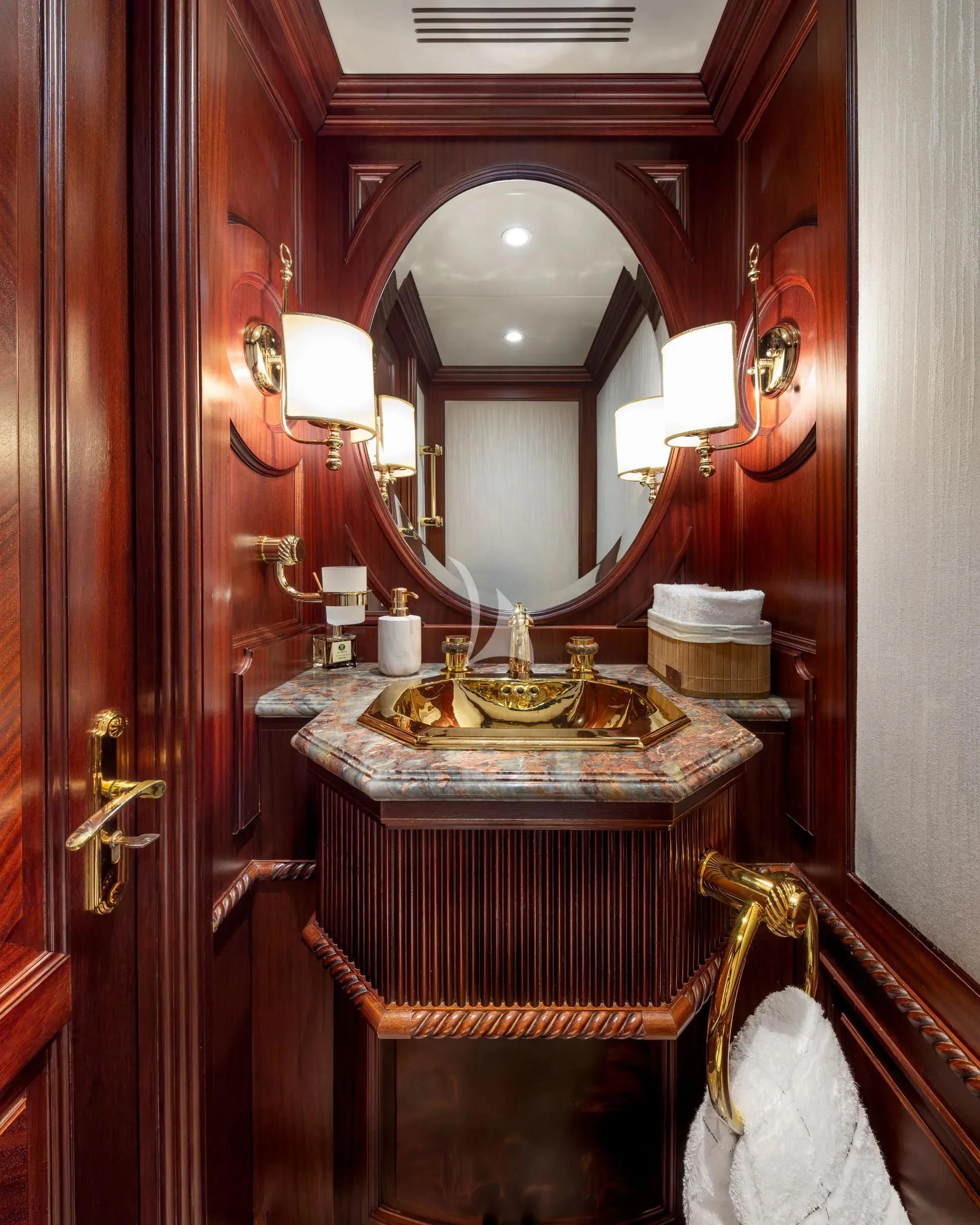 a bathroom with a mirror aboard AKIRA ONE Yacht for Charter