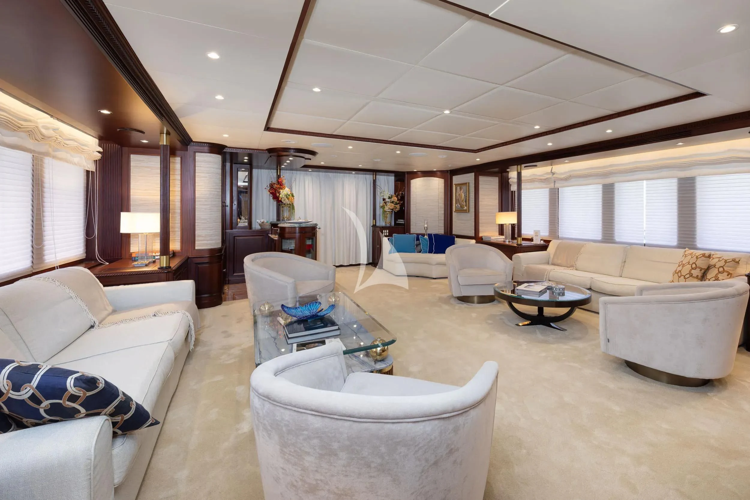 a living room with a large window aboard AKIRA ONE Yacht for Charter