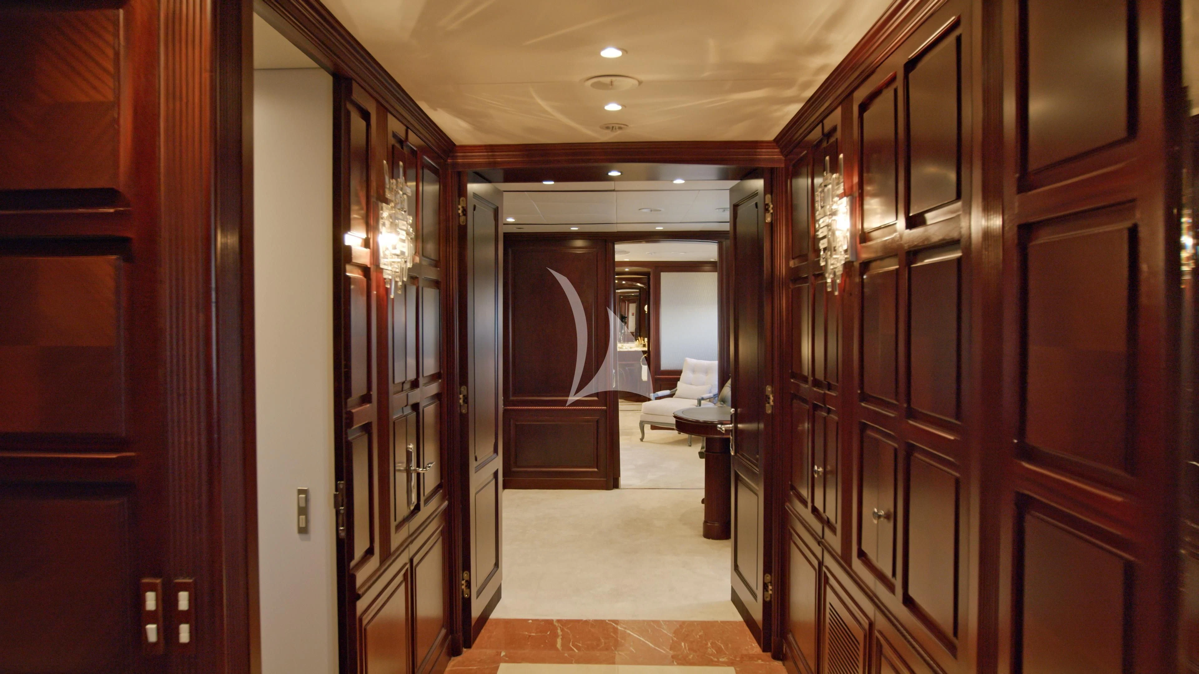 a hallway with doors aboard AKIRA ONE Yacht for Charter