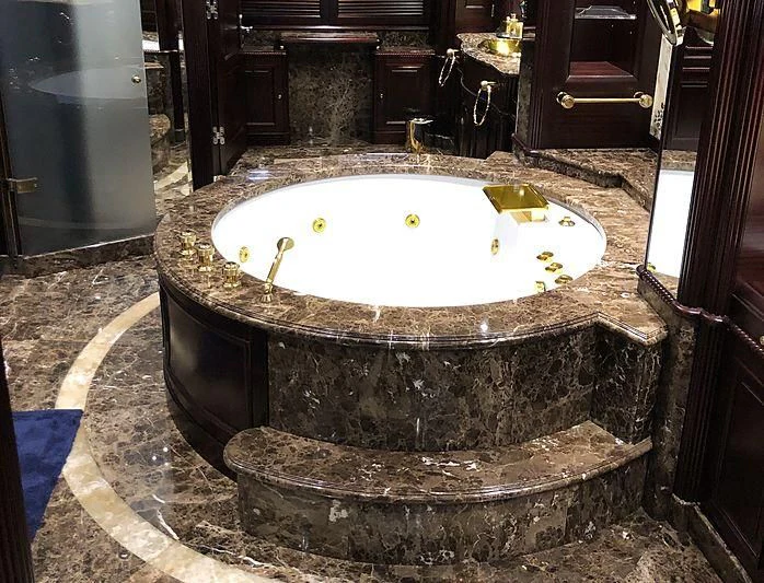 a large round sink in a room aboard AKIRA ONE Yacht for Charter