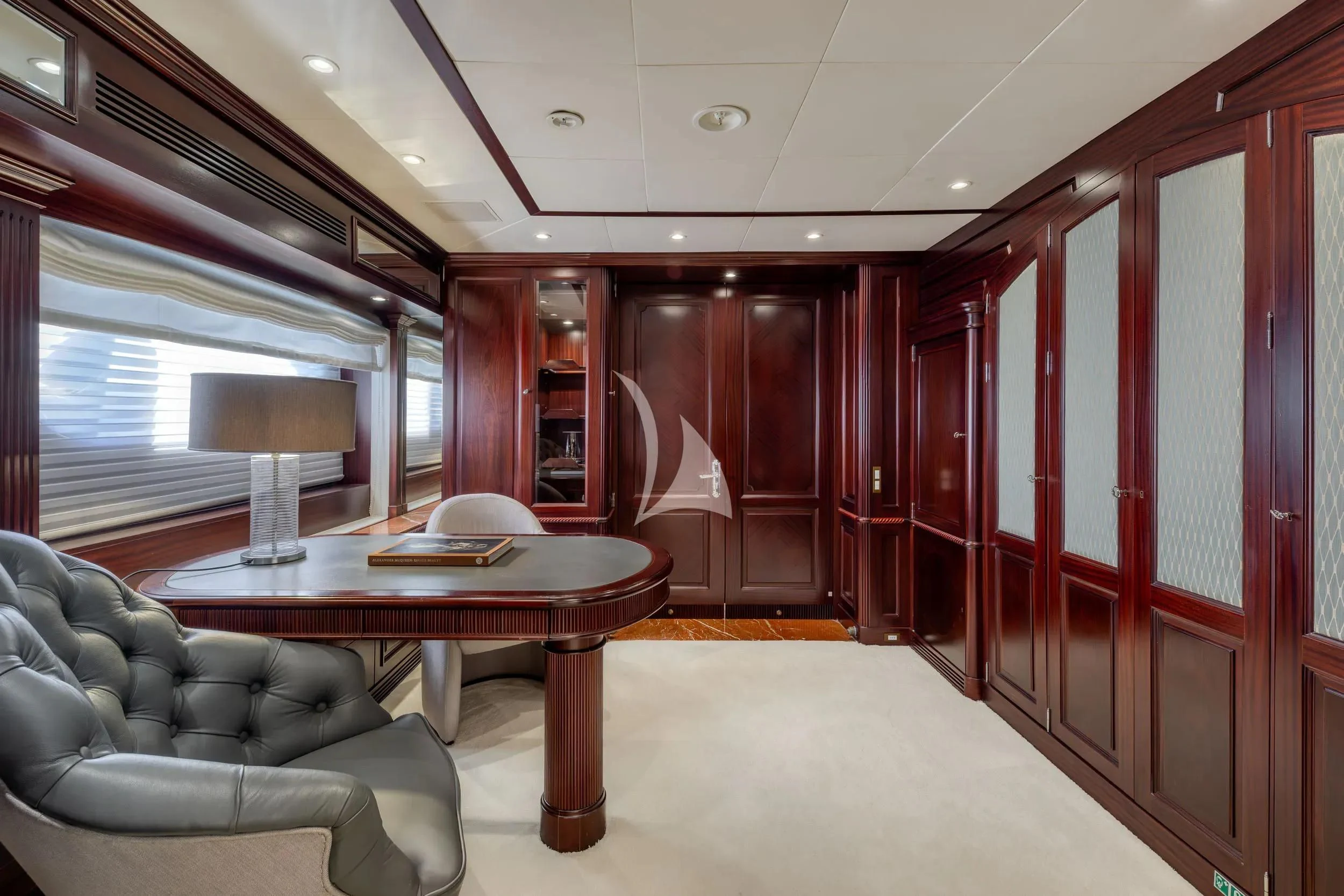 a room with a table and chairs aboard AKIRA ONE Yacht for Charter