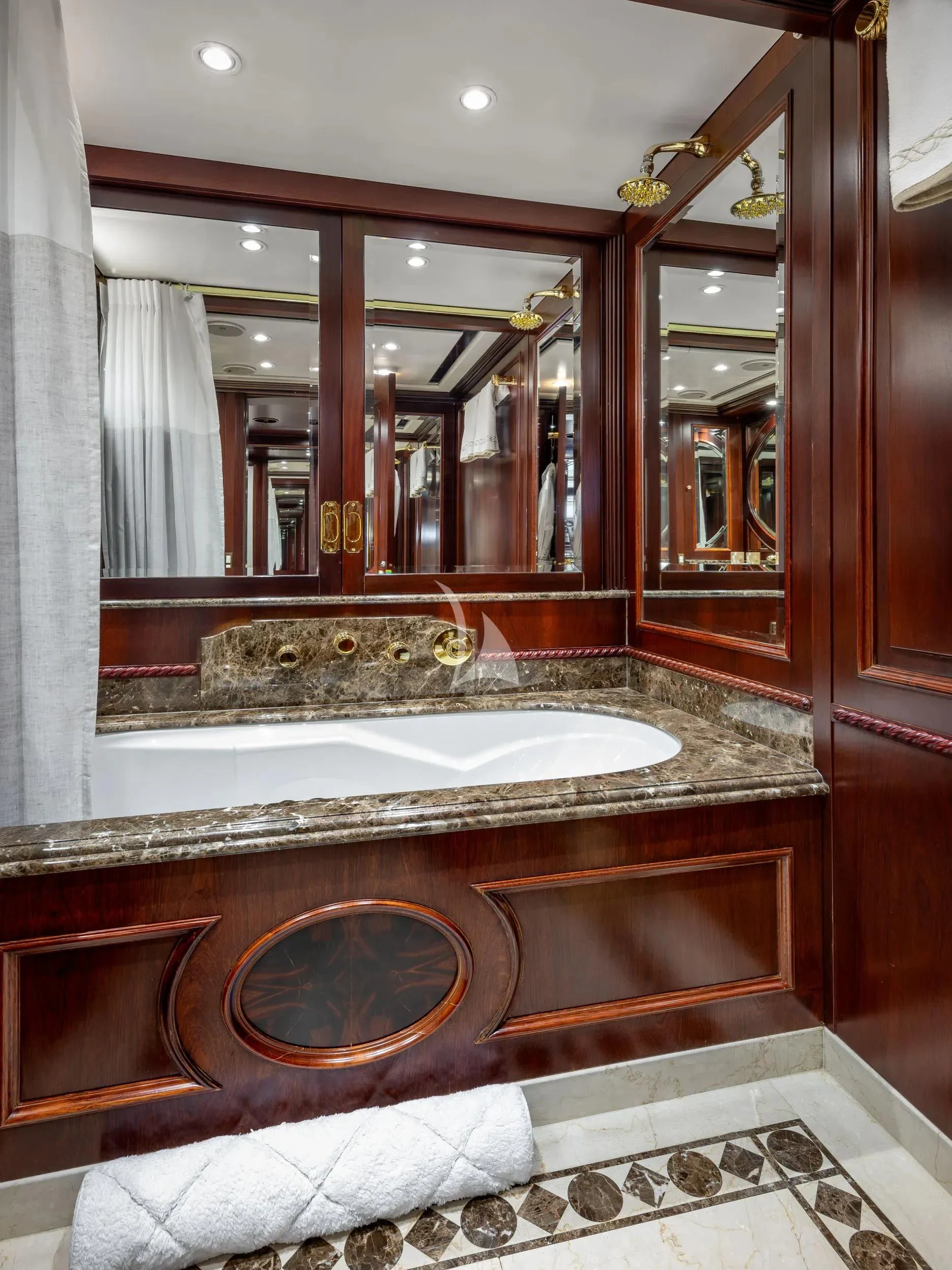 a bathroom with a large bathtub aboard AKIRA ONE Yacht for Charter