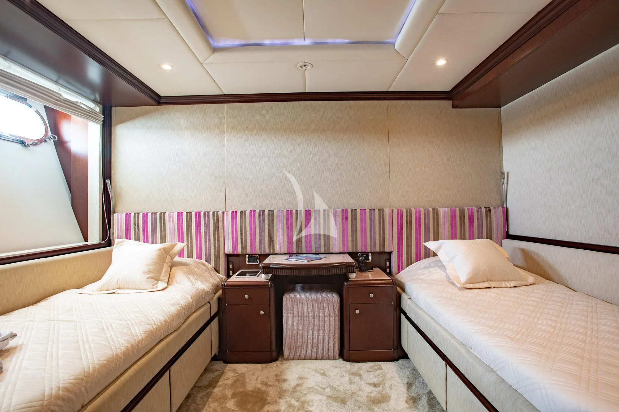 a room with two beds aboard AKIRA ONE Yacht for Charter