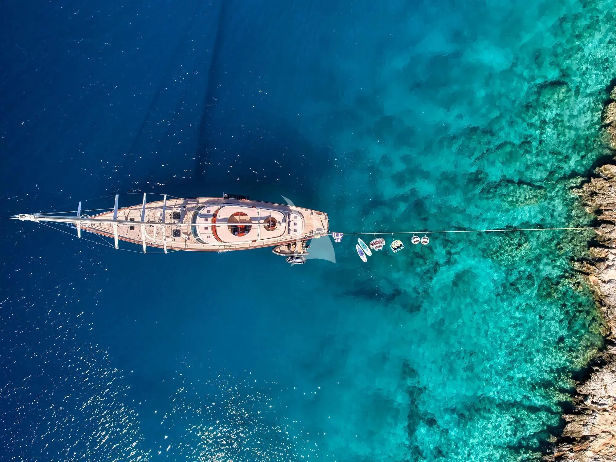 a boat in the water aboard GITANA Yacht for Charter