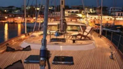 a large room with a large pool and a large building with a large pool and a large tower aboard GITANA Yacht for Charter