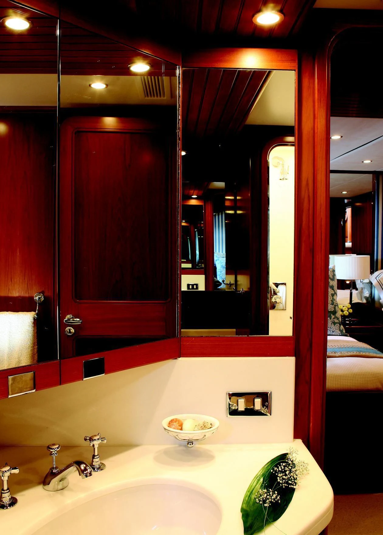 a bathroom with red walls aboard GITANA Yacht for Charter
