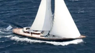 a white sailboat on the water aboard GITANA Yacht for Charter