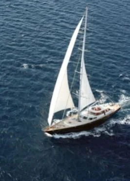 a sailboat on the water aboard GITANA Yacht for Charter