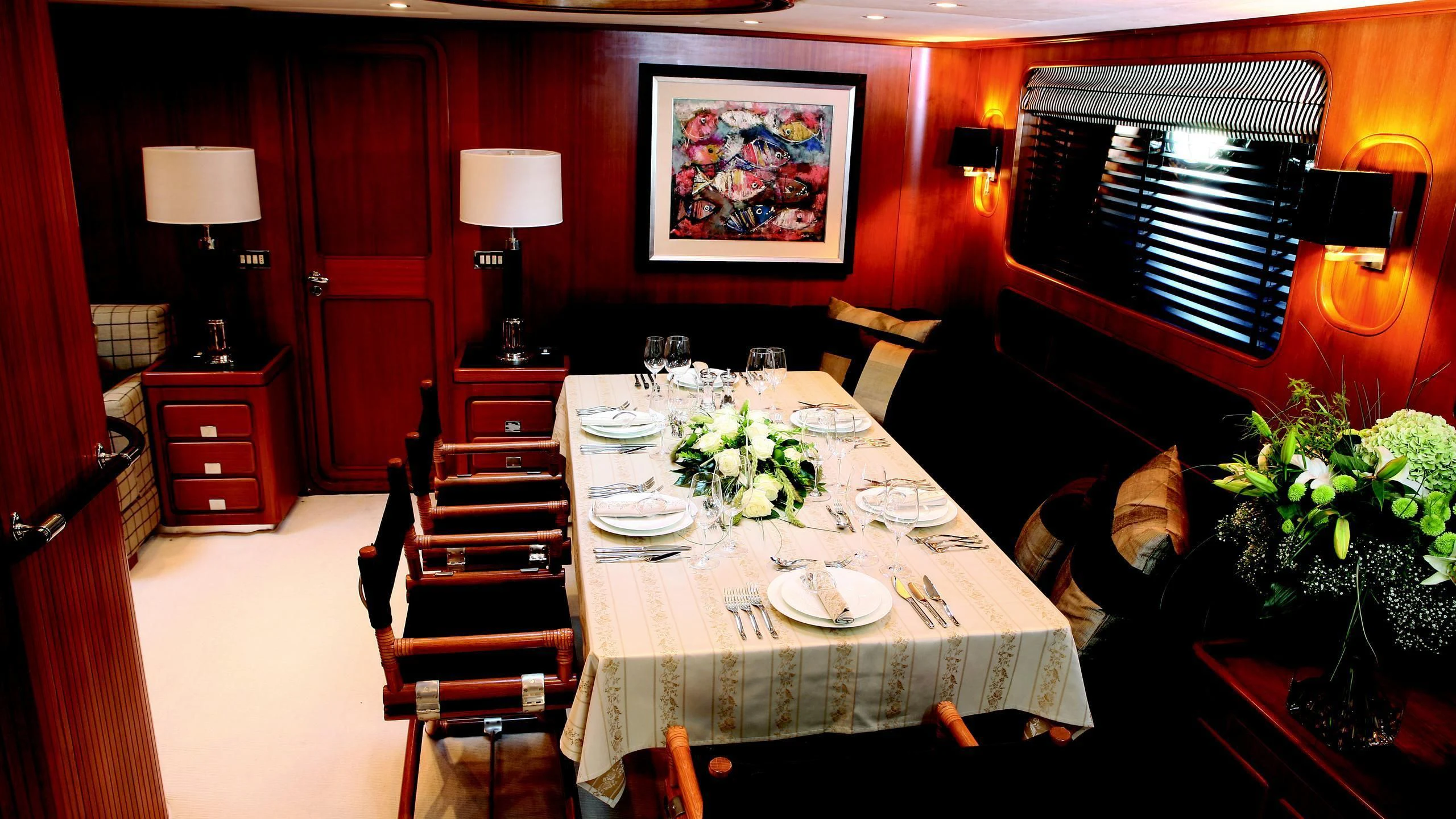 a dining room with a table and chairs aboard GITANA Yacht for Charter