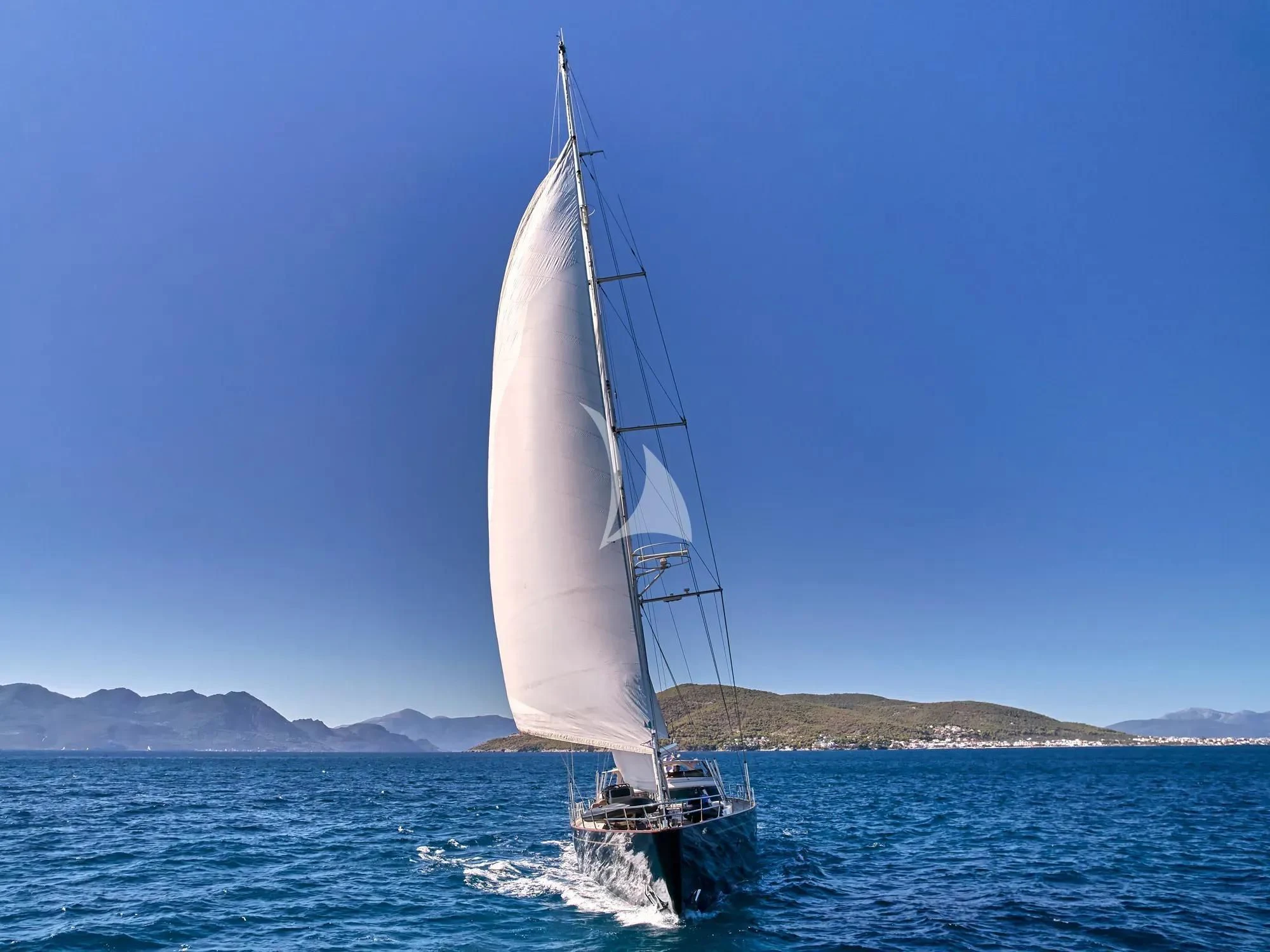 a sailboat on the water aboard GITANA Yacht for Charter