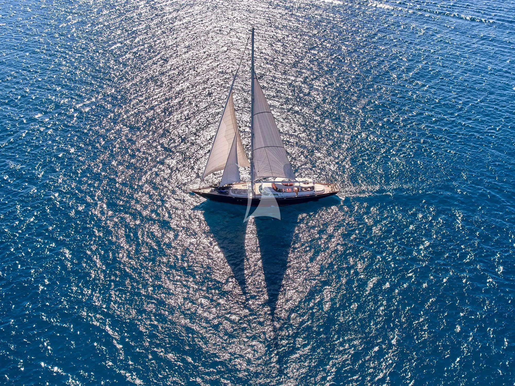 a sailboat in the water aboard GITANA Yacht for Charter