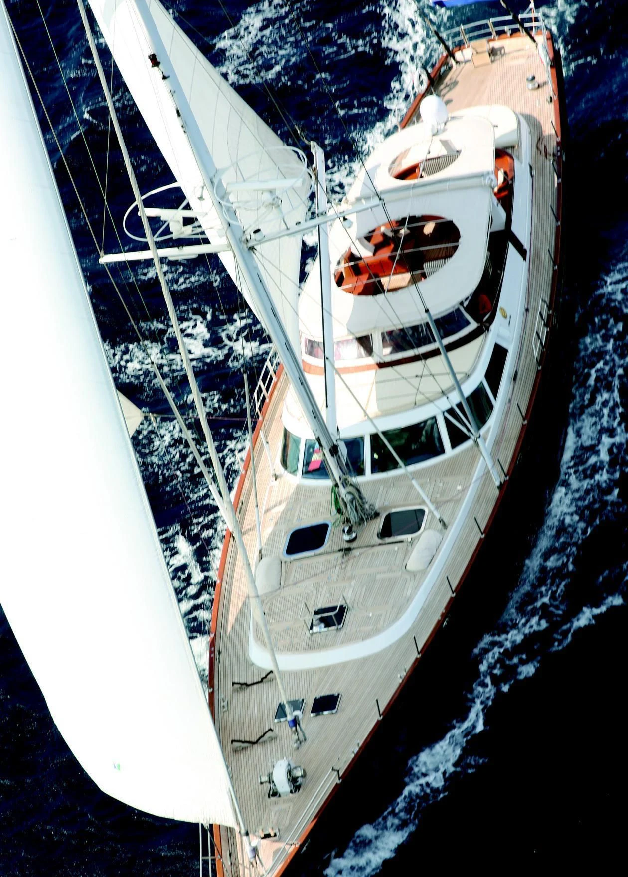 a white boat in the water aboard GITANA Yacht for Charter