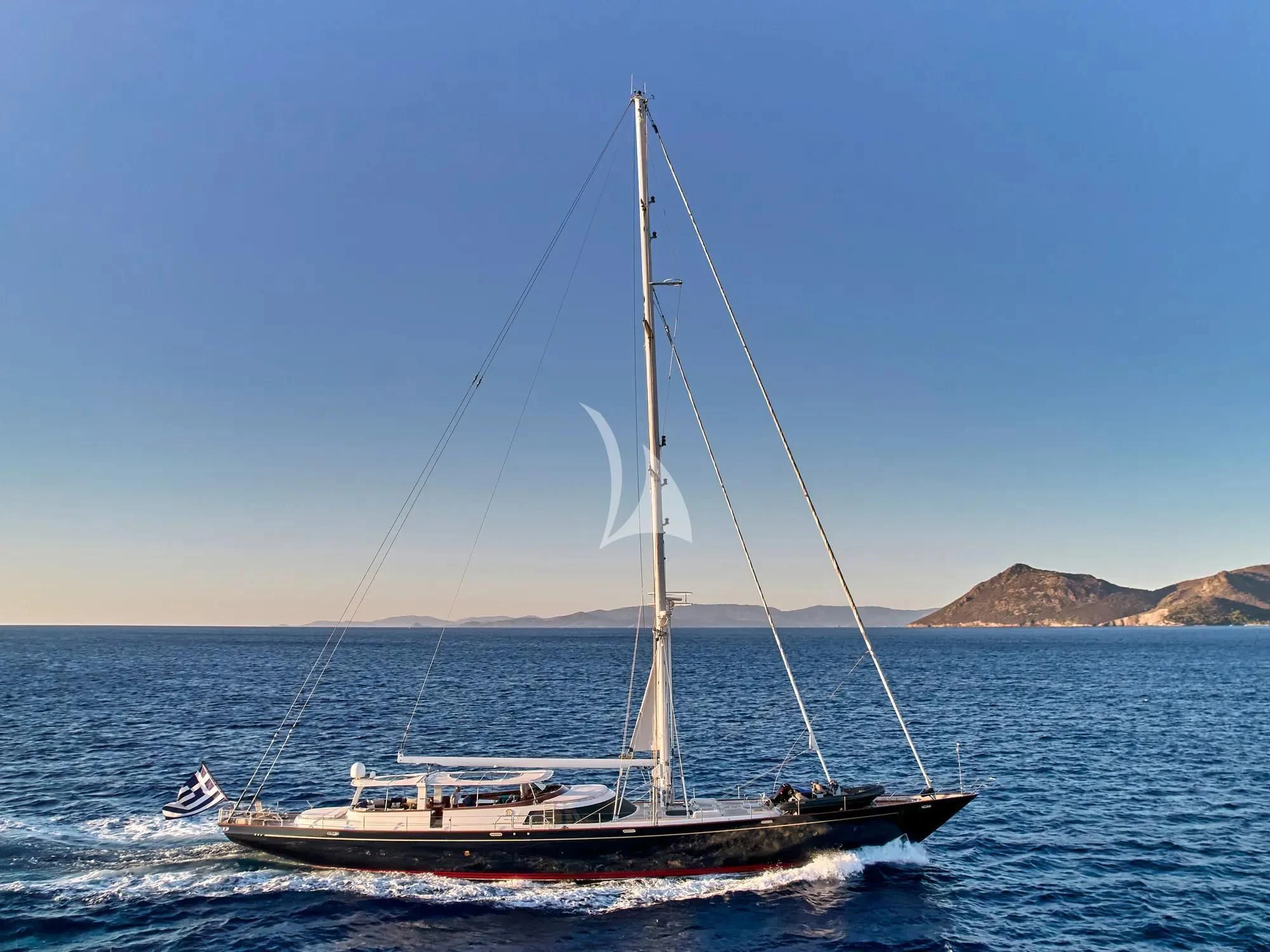 a sailboat on the water aboard GITANA Yacht for Charter