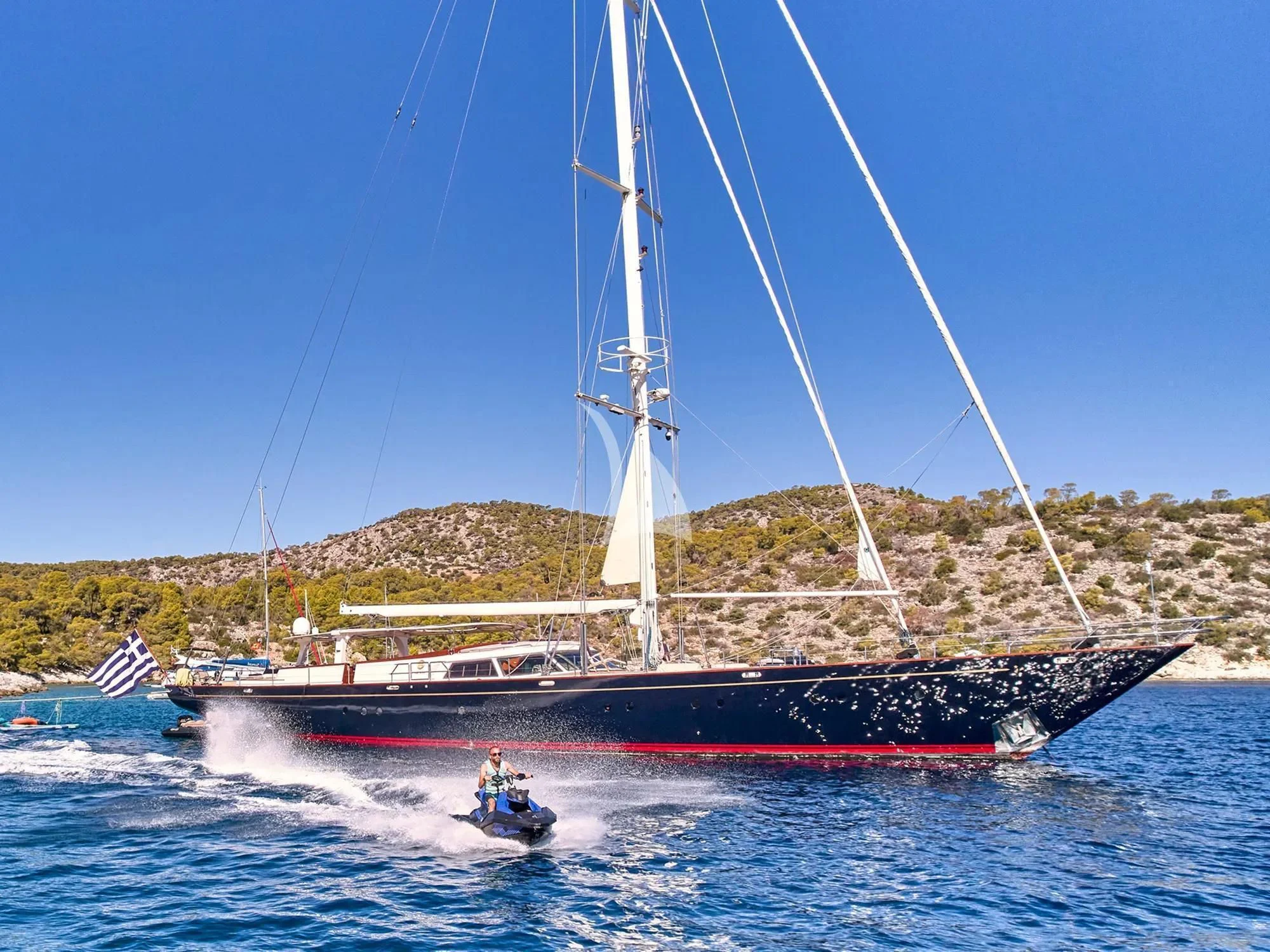 a boat on the water aboard GITANA Yacht for Charter