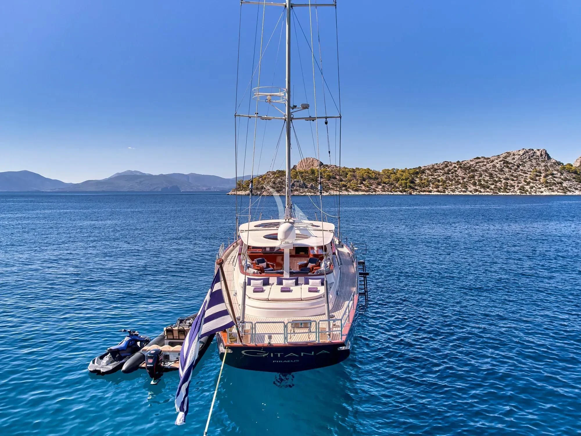 a boat on the water aboard GITANA Yacht for Charter
