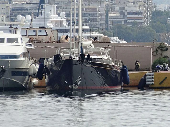boats docked in a harbor aboard GITANA Yacht for Charter