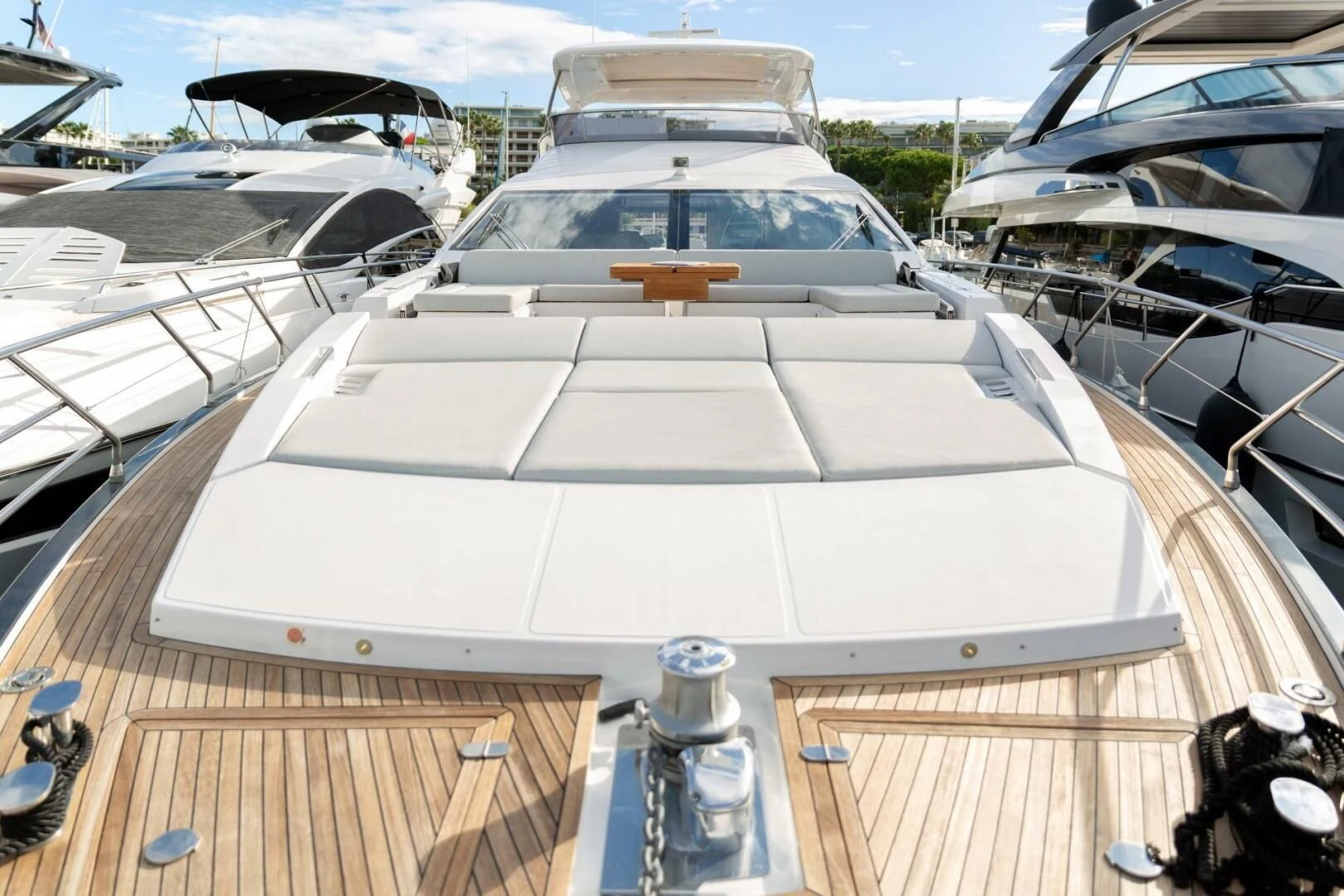 a white boat on a deck aboard AZIMUT 72 Yacht for Sale
