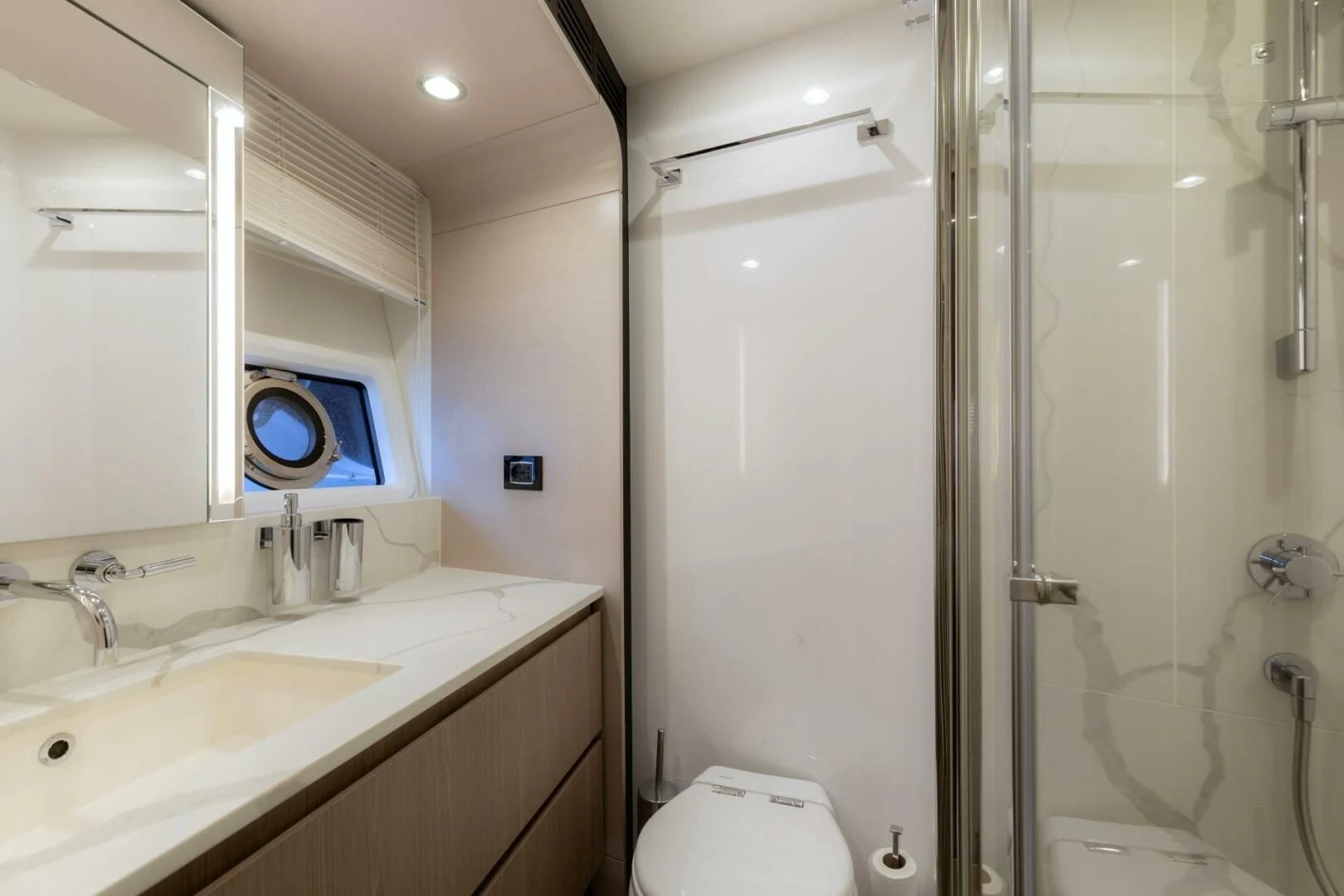 a bathroom with a shower and sink aboard AZIMUT 72 Yacht for Sale