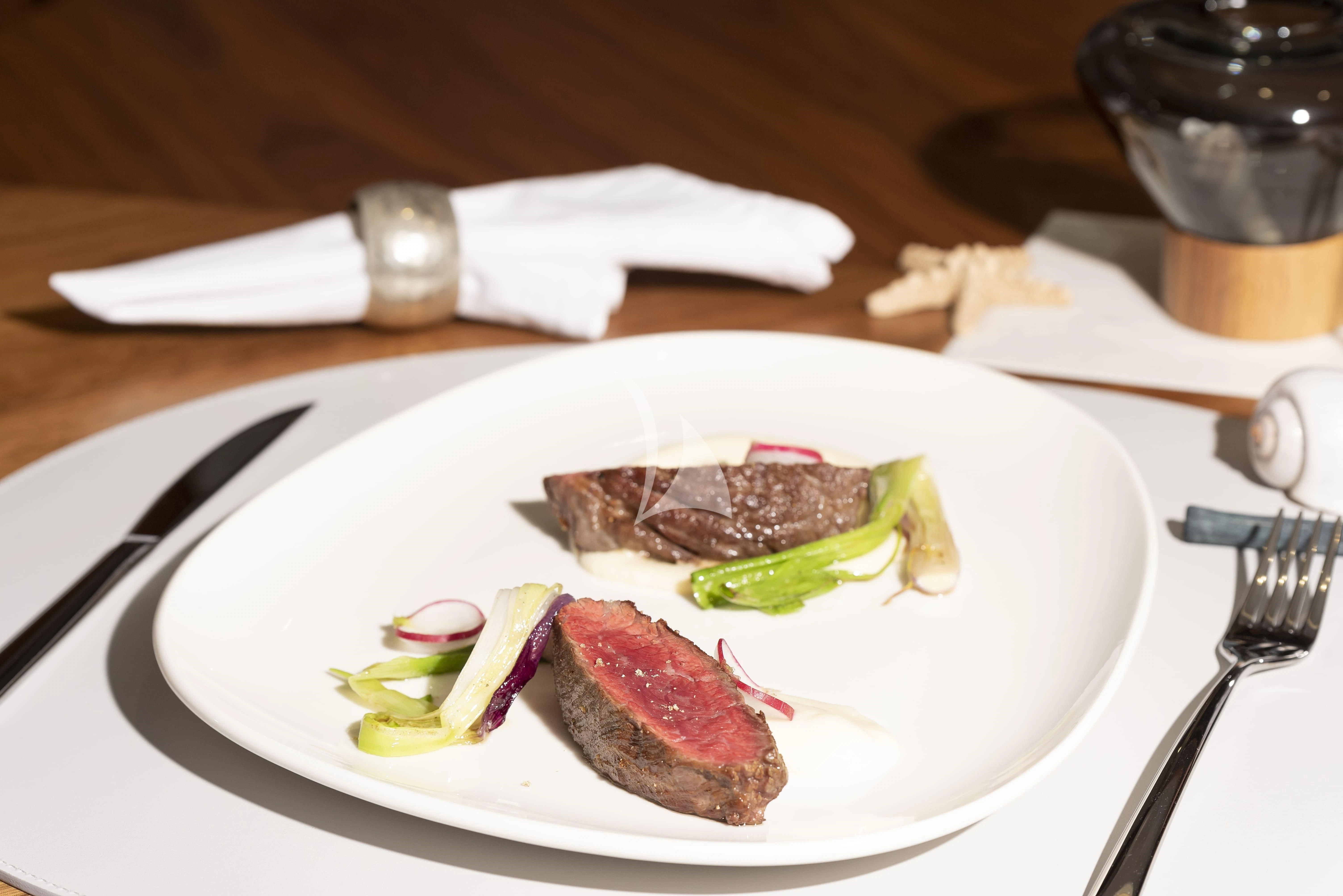 a plate of food aboard HUNKY DORY OF LONDON Yacht for Sale