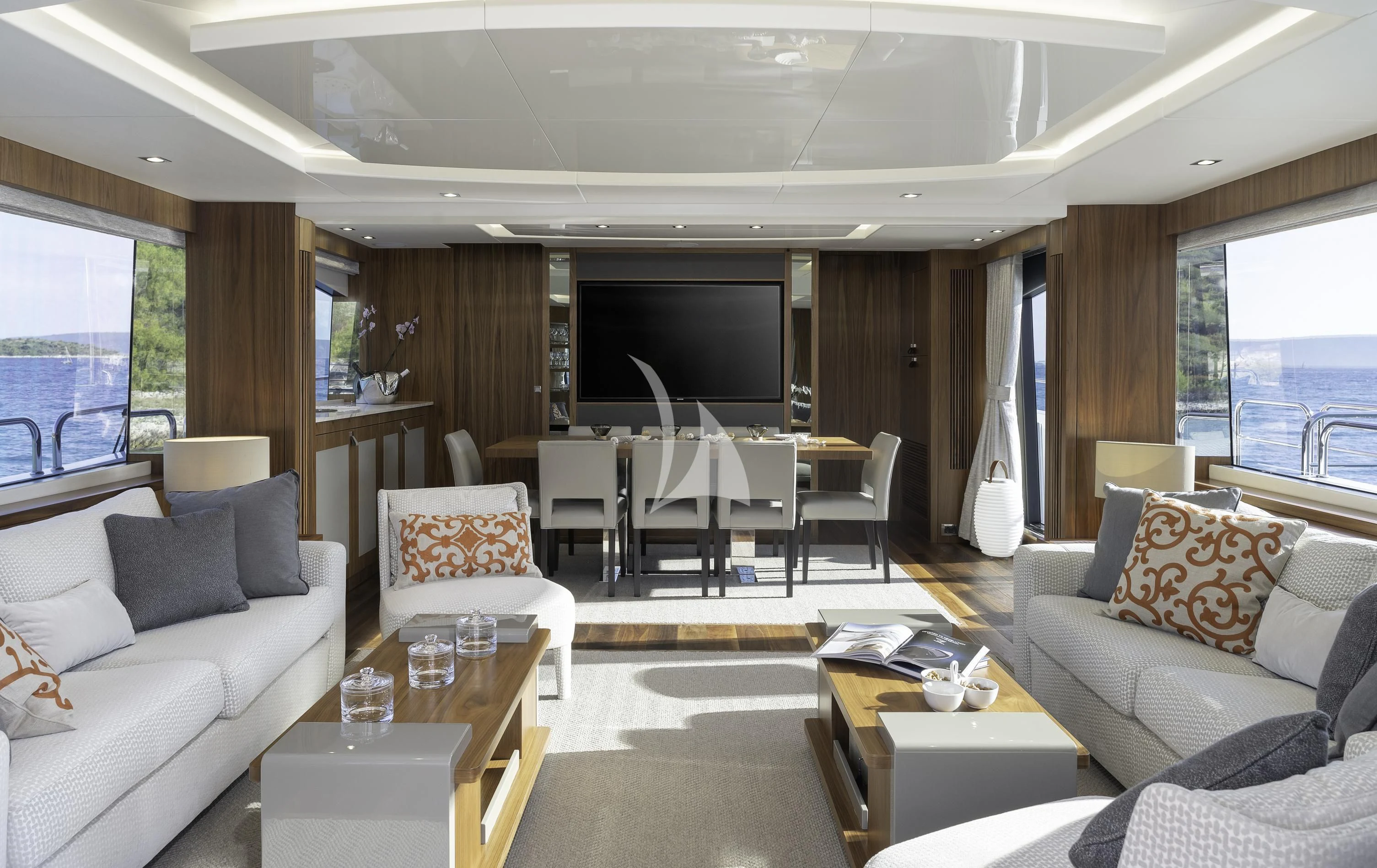 a living room with a couch and a tv aboard HUNKY DORY OF LONDON Yacht for Sale