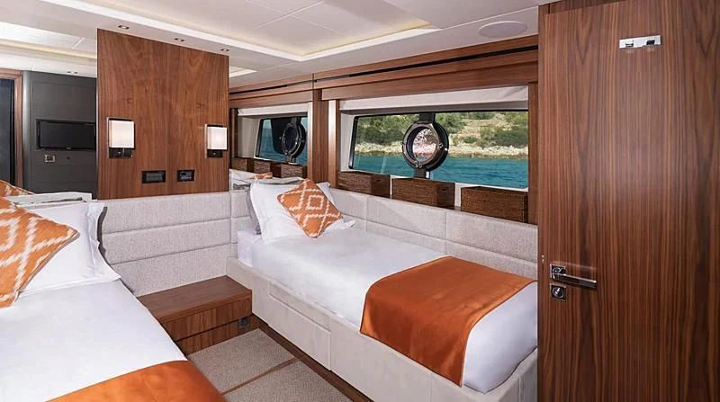 a room with two beds aboard HUNKY DORY OF LONDON Yacht for Sale