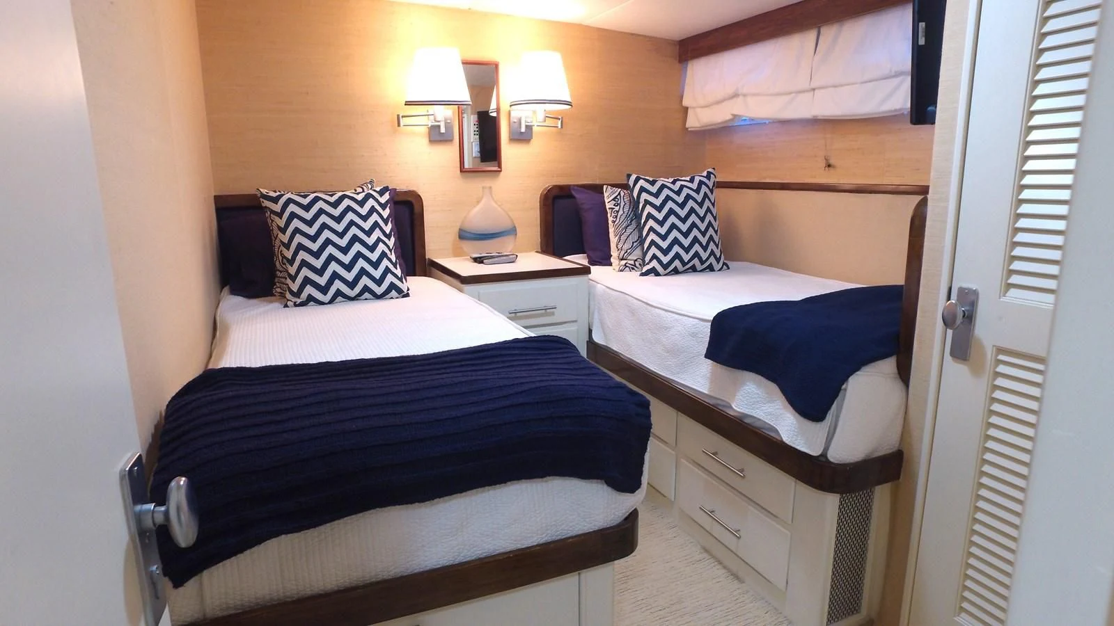 a couple of beds in a hotel room aboard BAREFOOT V Yacht for Sale