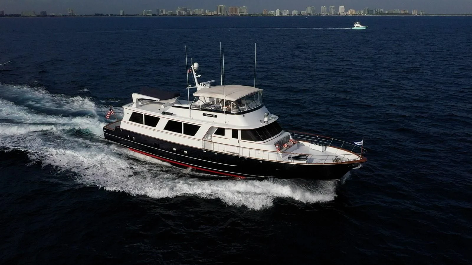 a boat on the water aboard BAREFOOT V Yacht for Sale