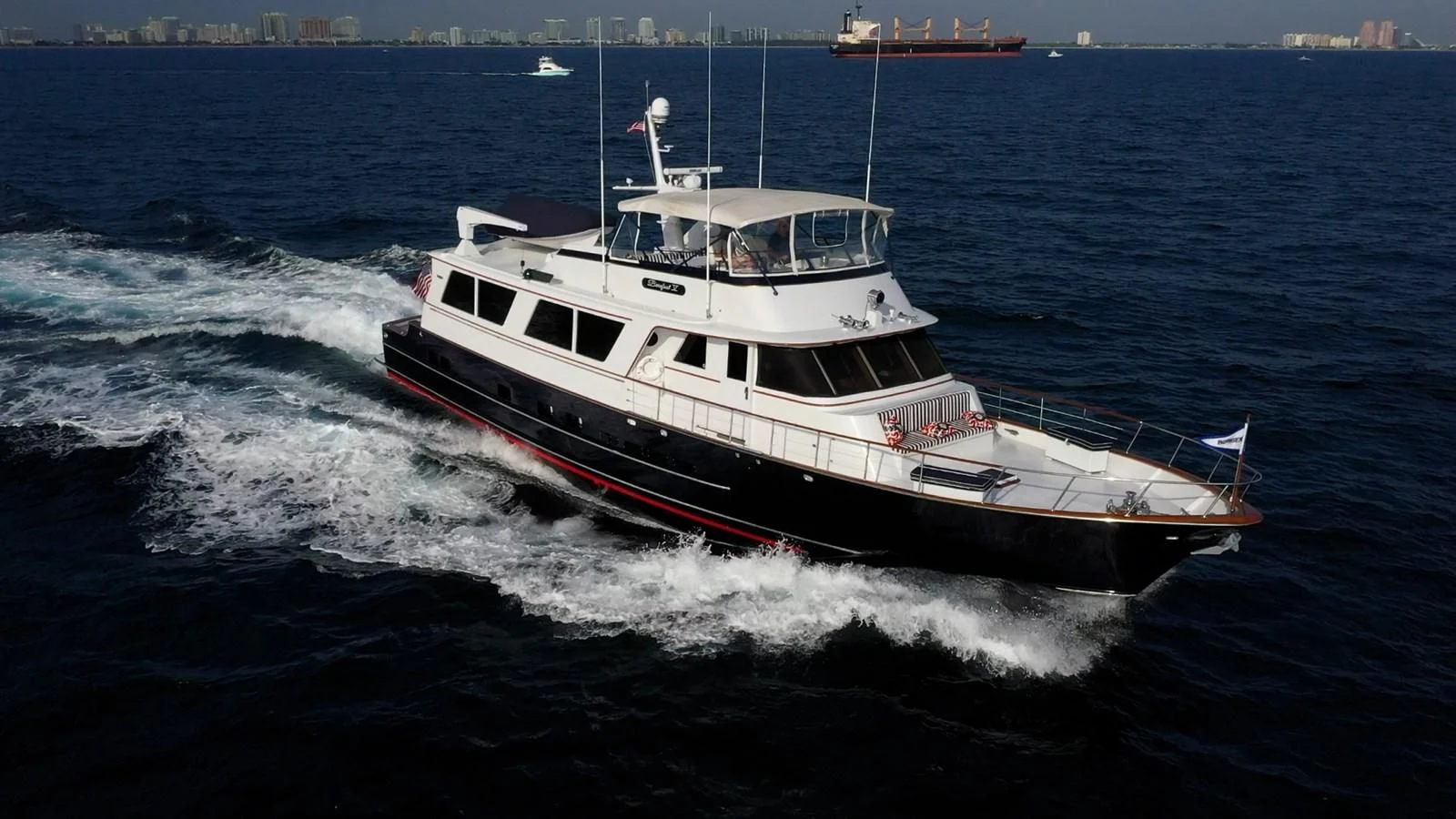 a boat on the water aboard BAREFOOT V Yacht for Sale