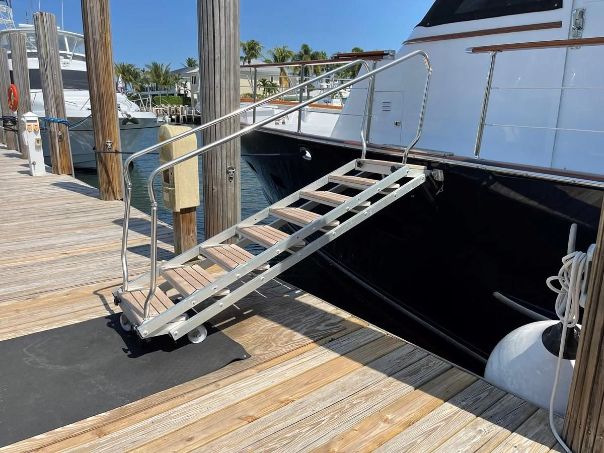 a boat on a dock aboard BAREFOOT V Yacht for Sale