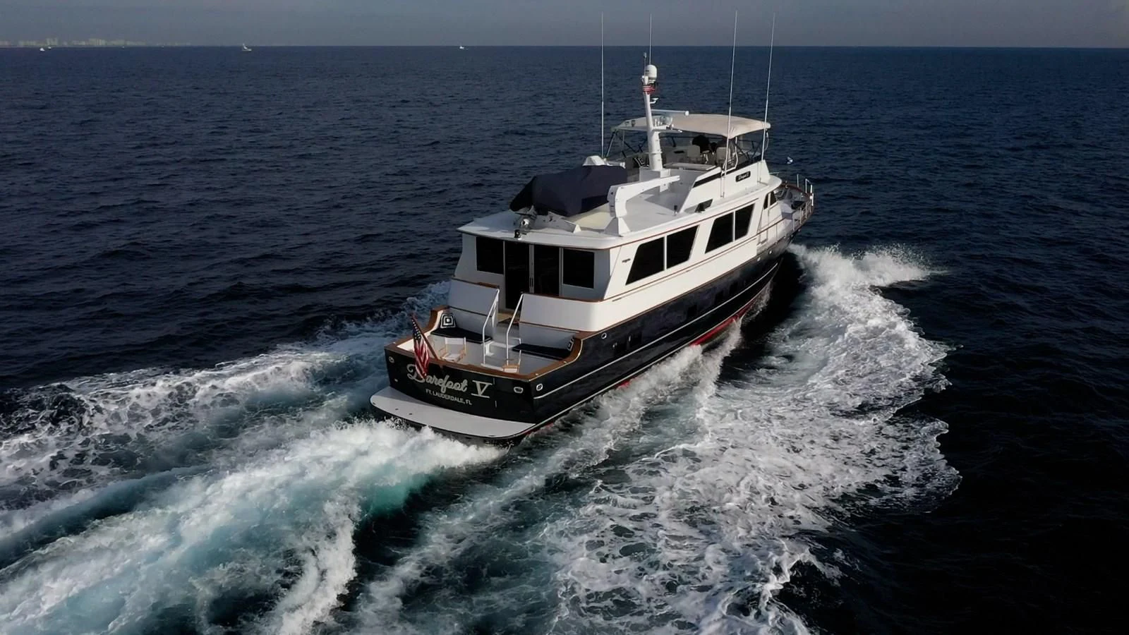 a boat on the water aboard BAREFOOT V Yacht for Sale