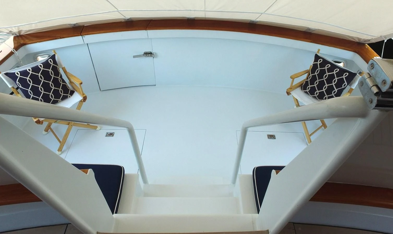 a white ceiling with a fan aboard BAREFOOT V Yacht for Sale