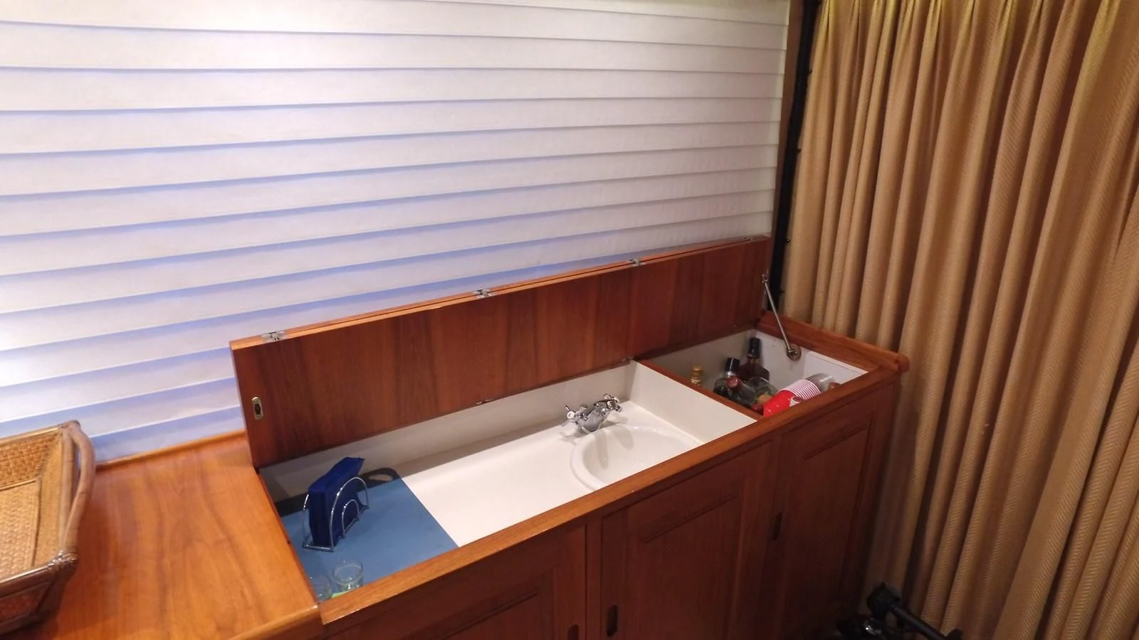 a bathroom with a sink and a towel on the counter aboard BAREFOOT V Yacht for Sale