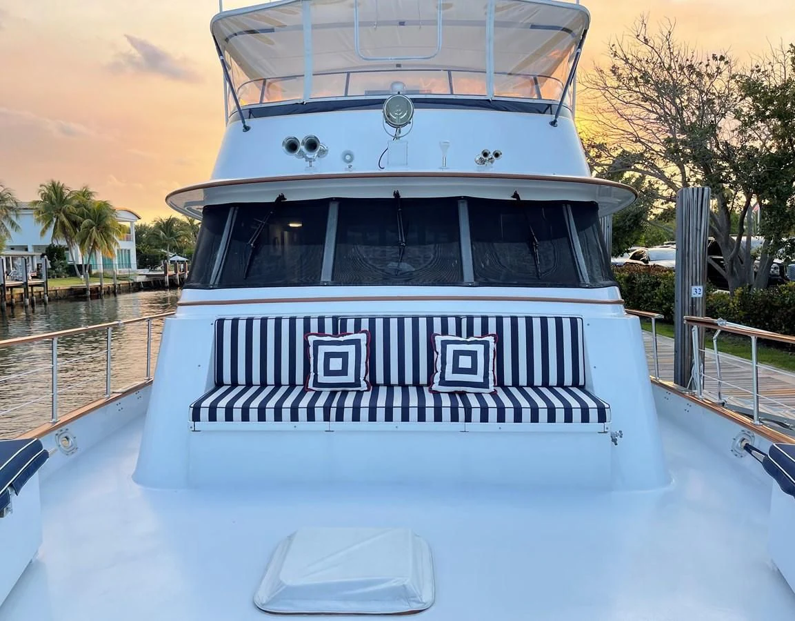 a boat on a dock aboard BAREFOOT V Yacht for Sale