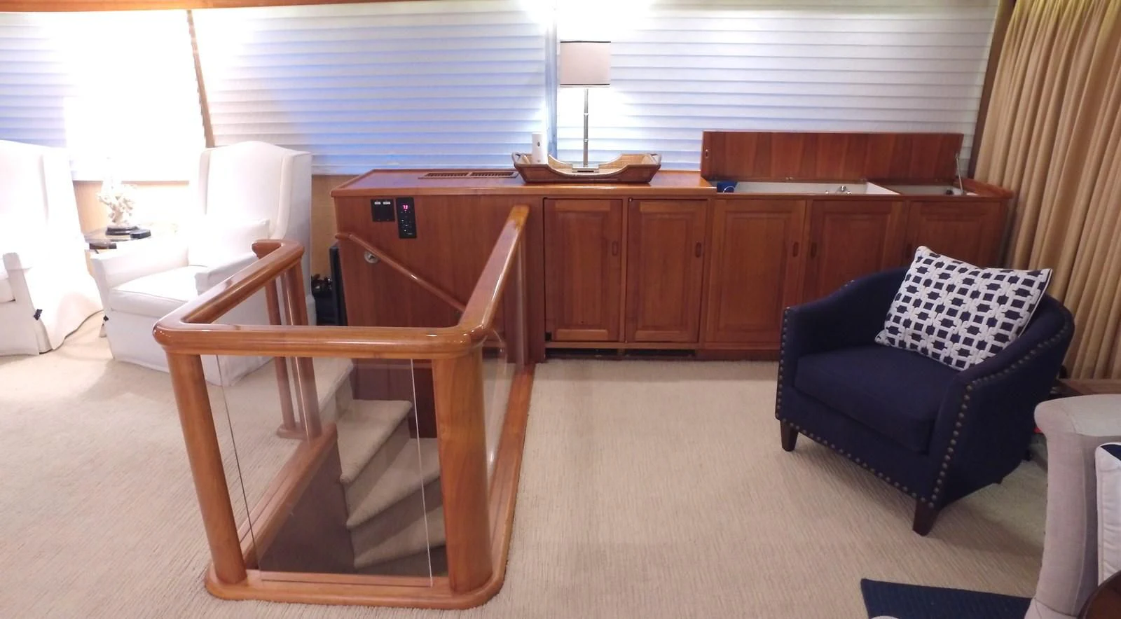 a room with a chair and desk aboard BAREFOOT V Yacht for Sale