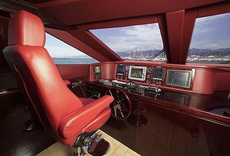 inside of a red car aboard ANLIA Yacht for Sale