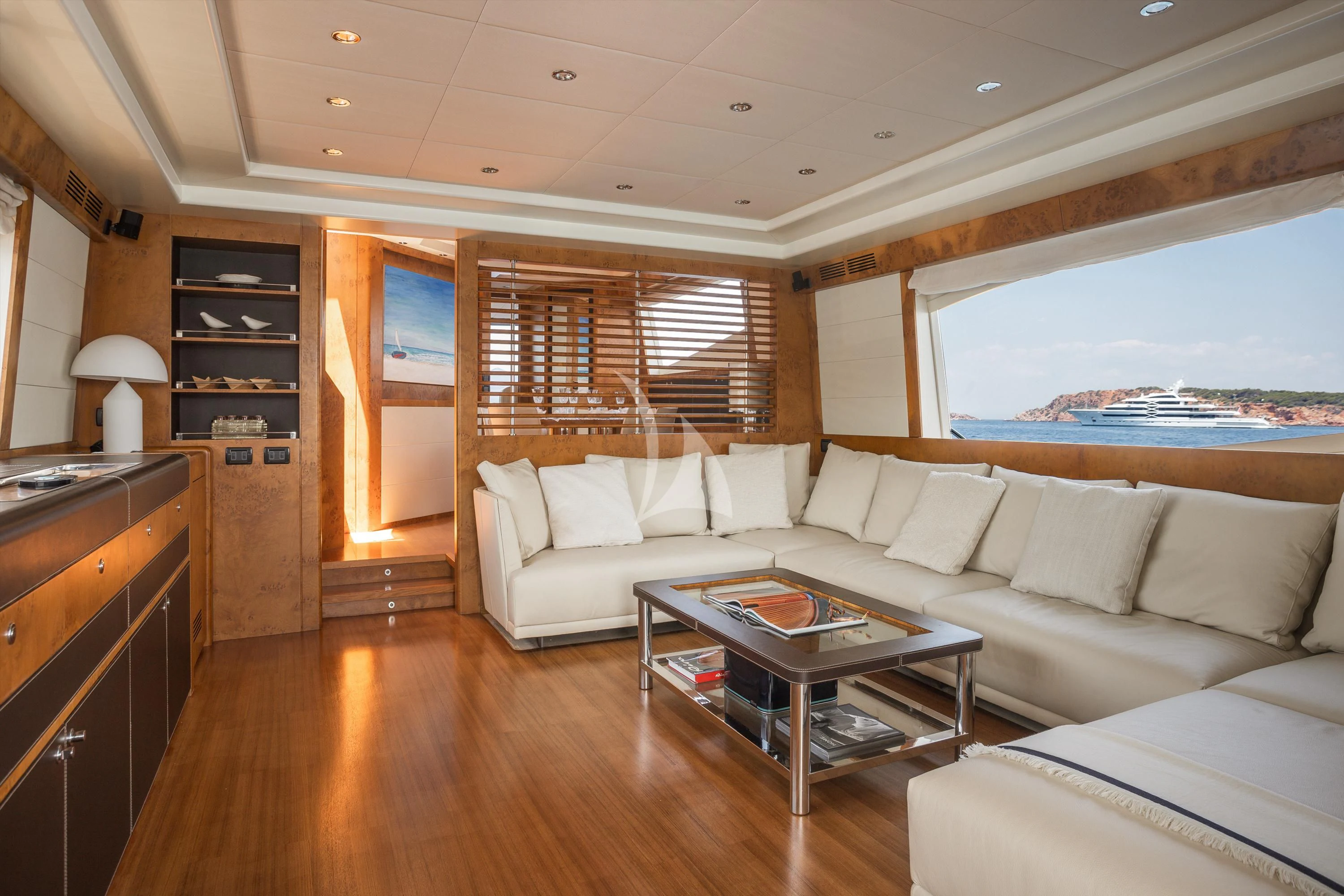 a living room with a couch and a table aboard ANLIA Yacht for Sale
