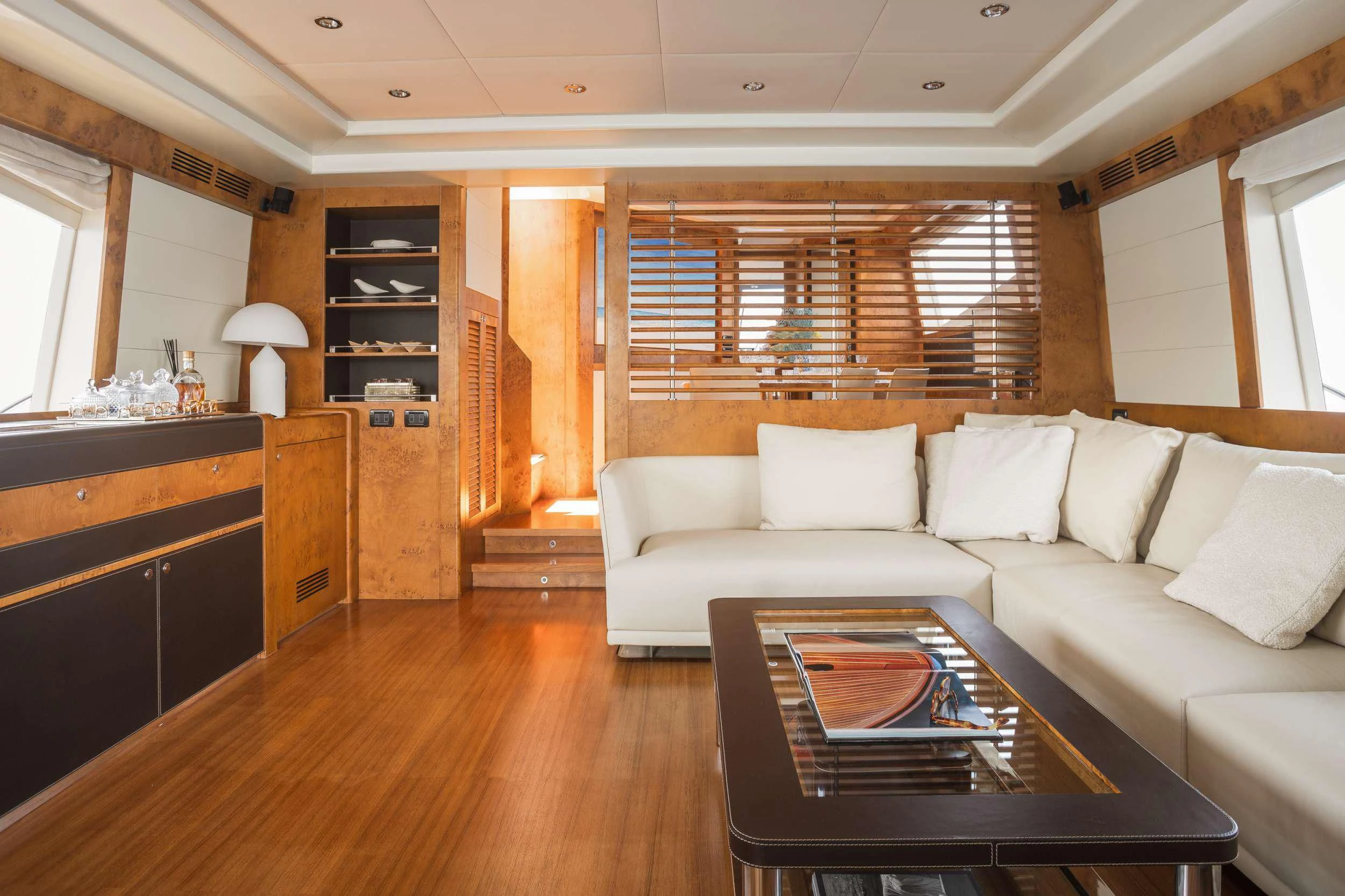 a living room with a couch and a table aboard ANLIA Yacht for Sale