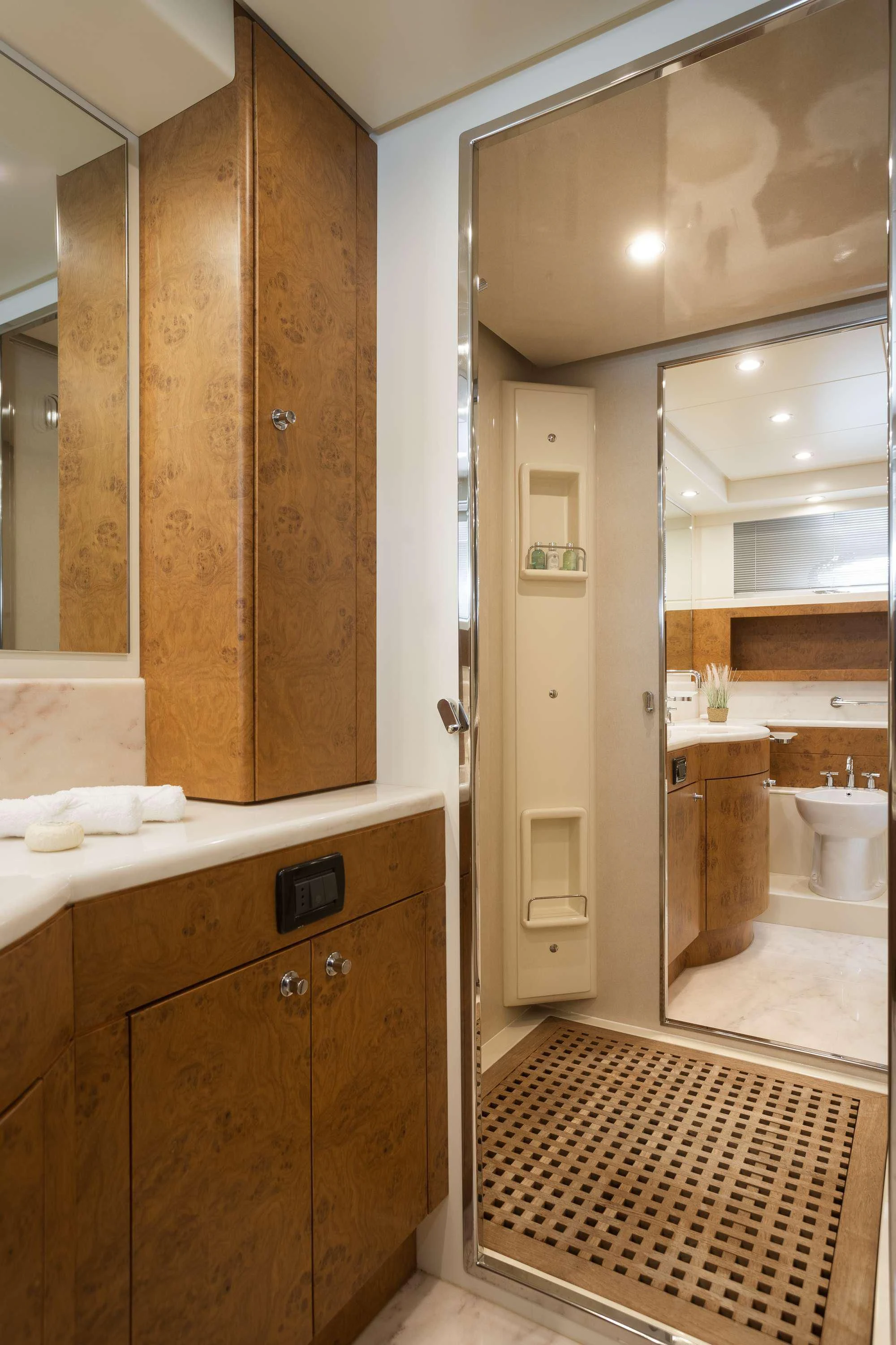 a bathroom with a large mirror aboard ANLIA Yacht for Sale