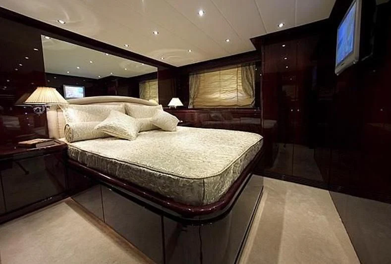 a hotel room with a bed aboard ANLIA Yacht for Sale