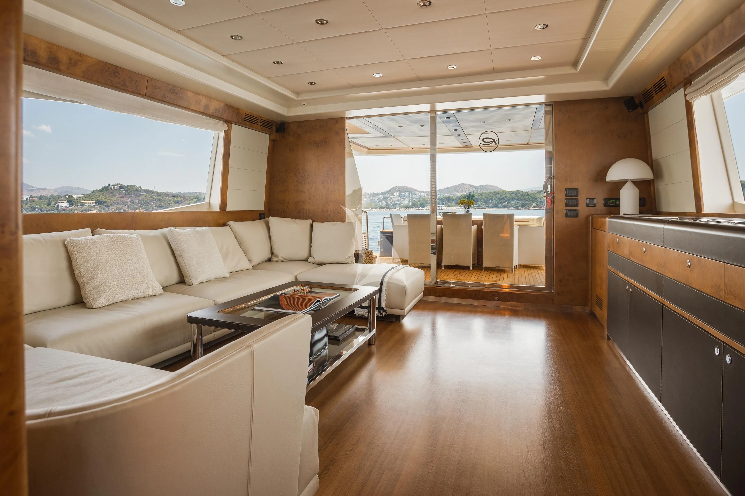 a living room with a large window aboard ANLIA Yacht for Sale