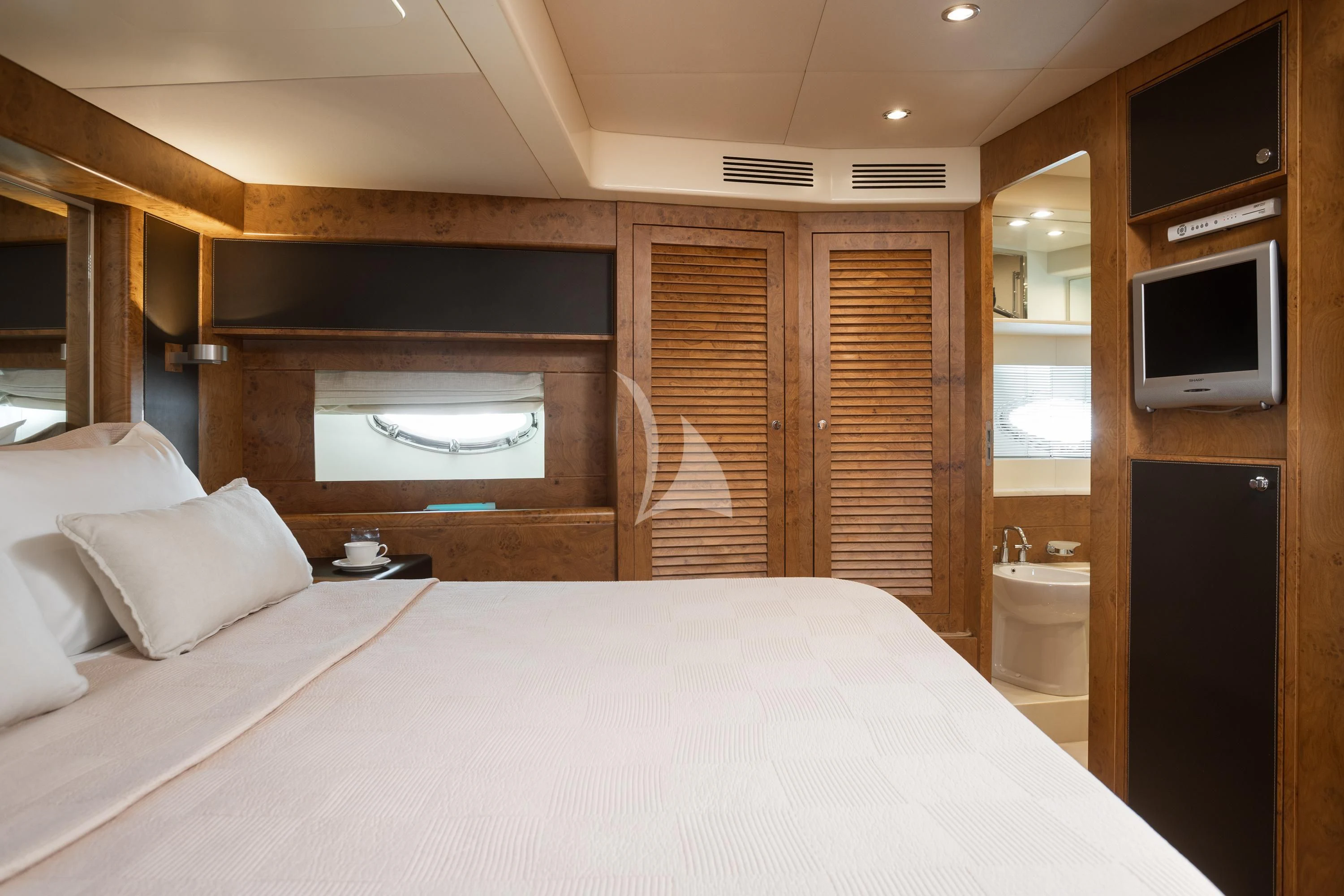 a bed in a room aboard ANLIA Yacht for Sale