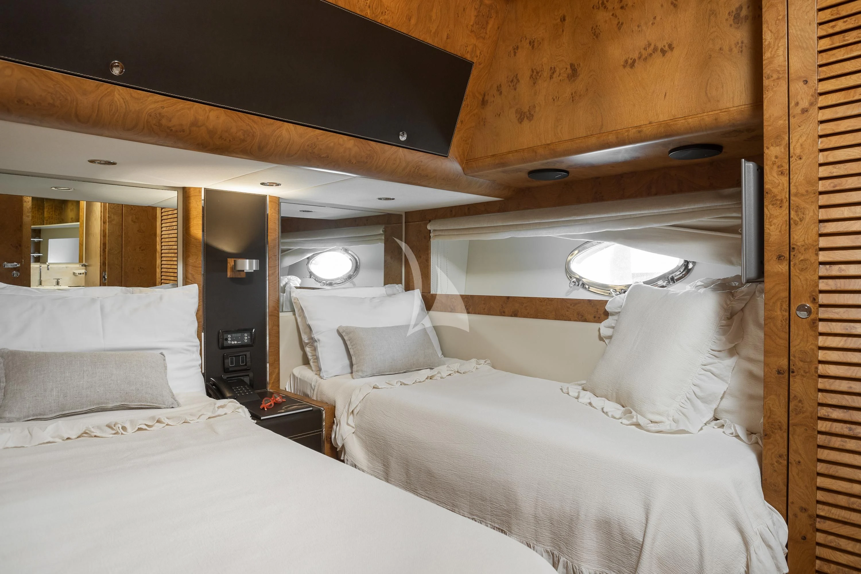 a room with two beds aboard ANLIA Yacht for Sale