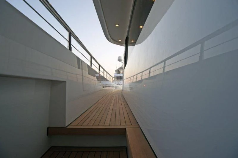 a long wooden walkway aboard TATIANA I Yacht for Sale