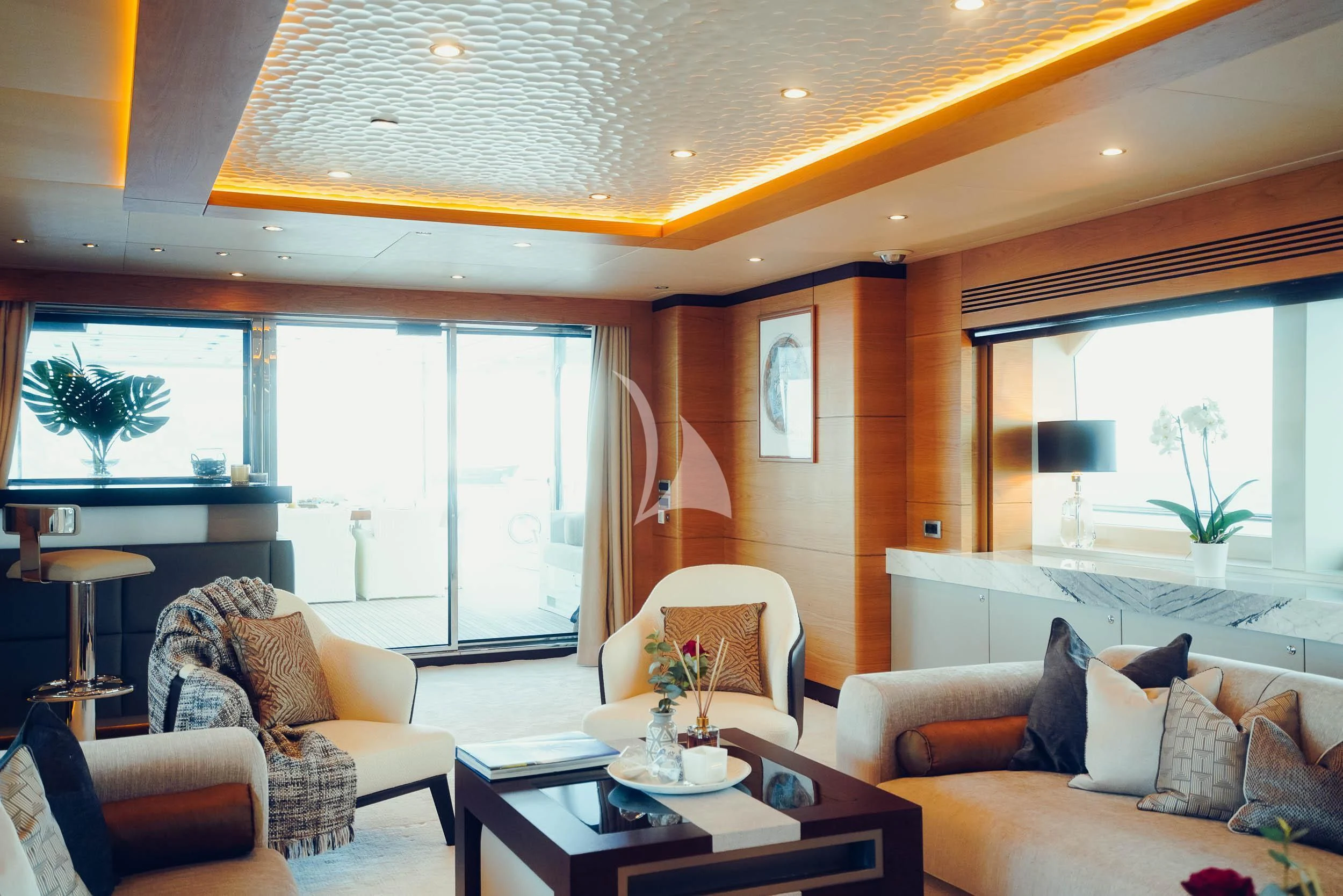 a living room with a large window aboard TATIANA I Yacht for Sale