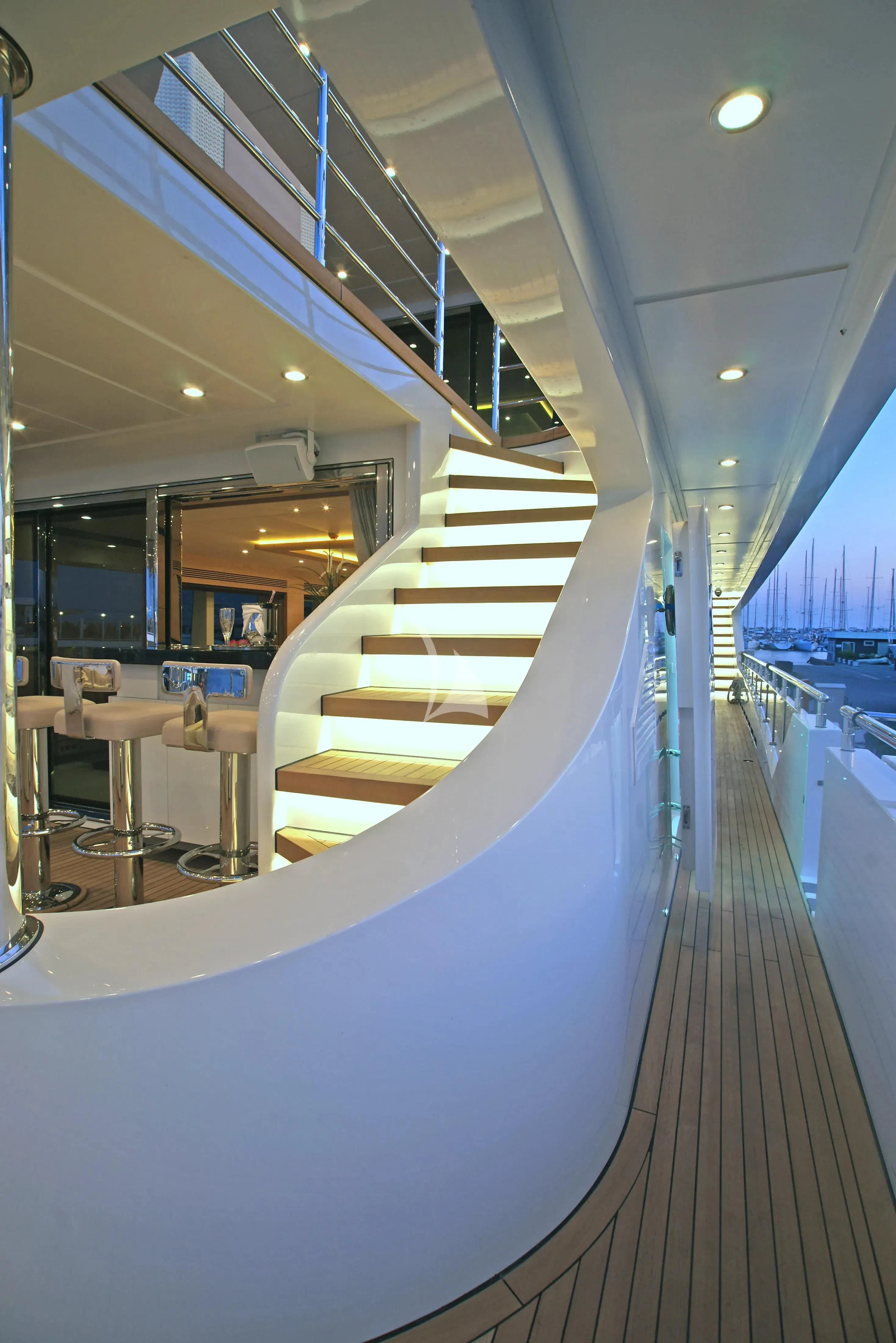 a long hallway with white walls aboard TATIANA I Yacht for Sale