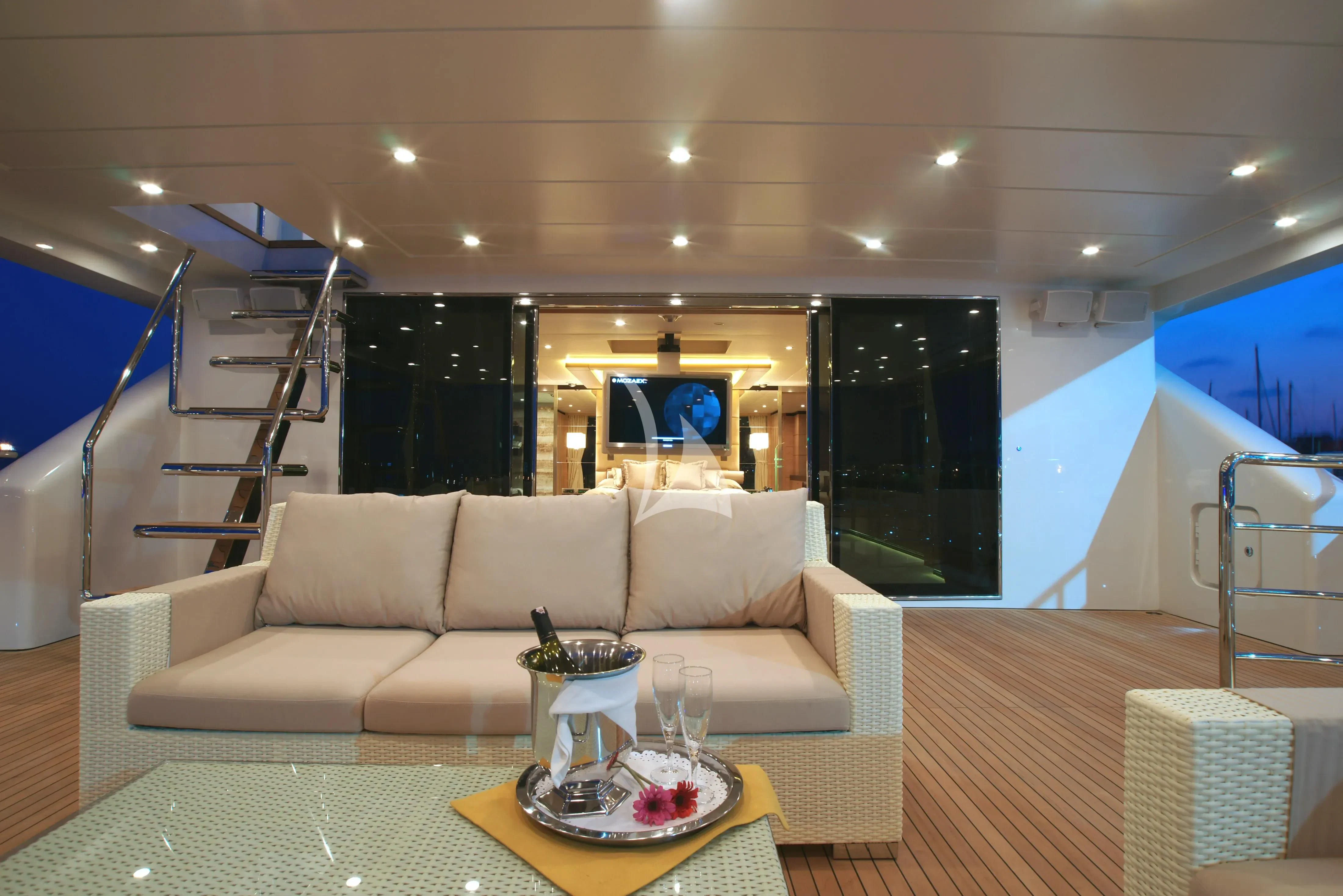 a living room with a large window aboard TATIANA I Yacht for Sale
