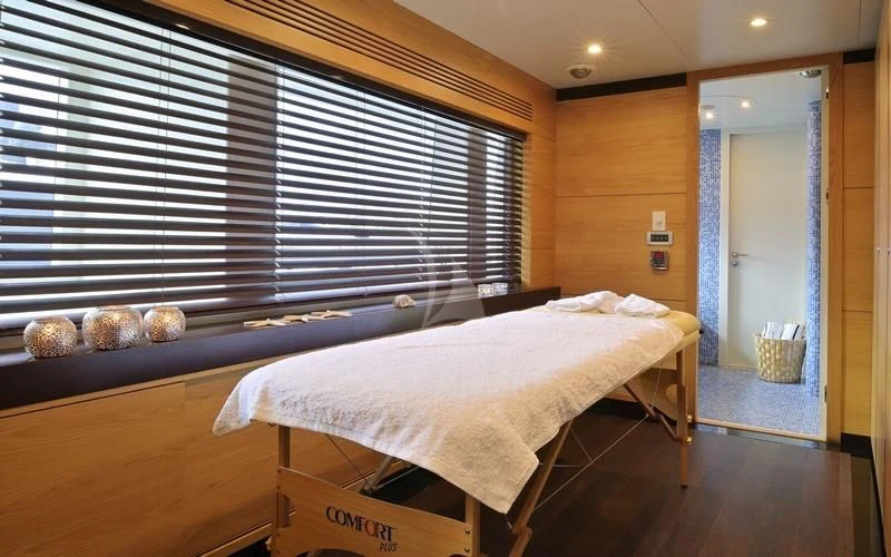 a bed in a room aboard TATIANA I Yacht for Sale